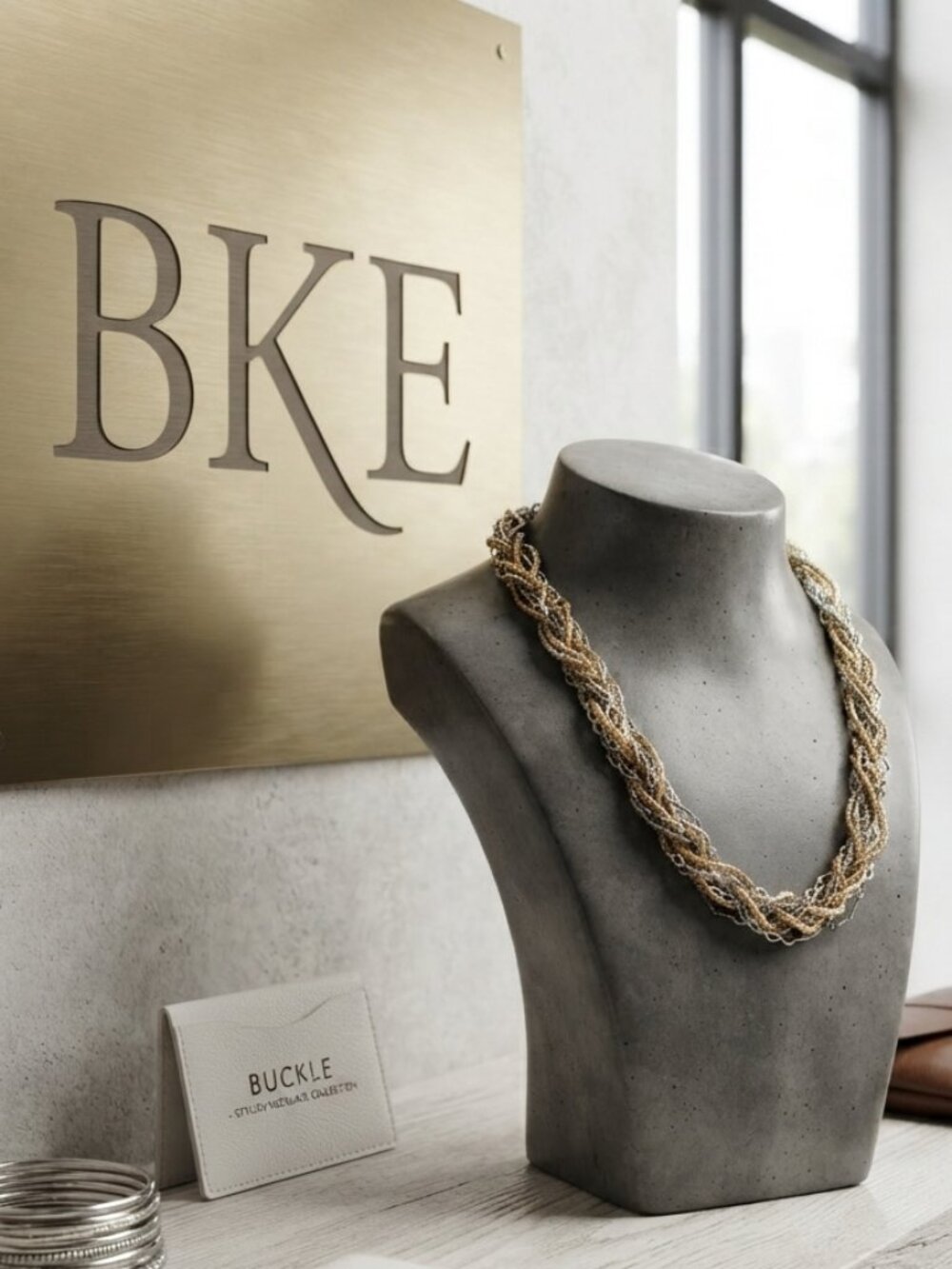 BKE chic multitone intertwined with silver chain in back of necklace